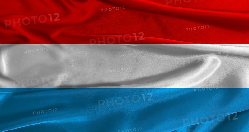 Flag of Luxembourg with fabric textured background. Close up of National flag of Luxembourg with realistic texture