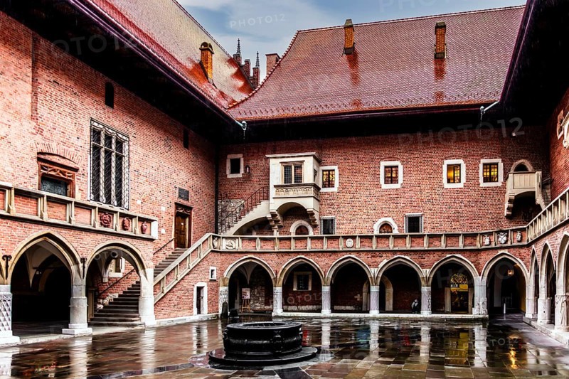 Arcade courtyard with fountain, Collegium Maius oldest building of the Jagellonian University, 1364, Krakow, Poland