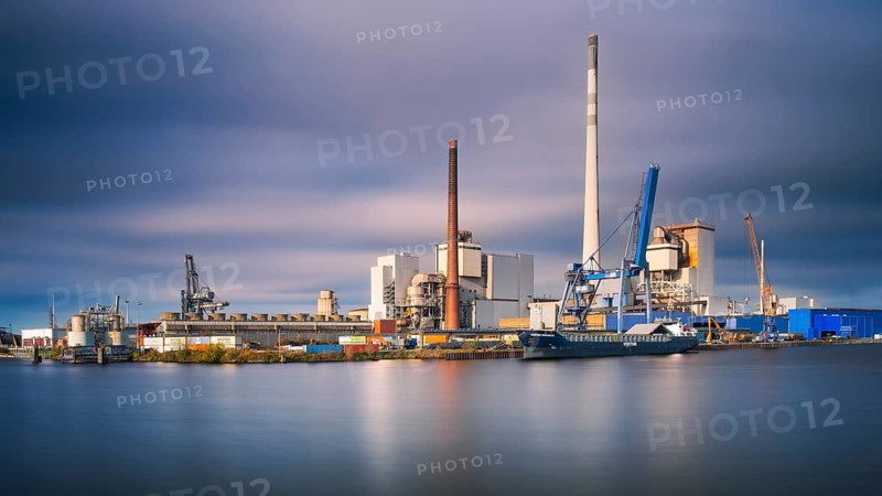 View across a harbor basin to the Kalihafen industrial area in Bremen, Germany