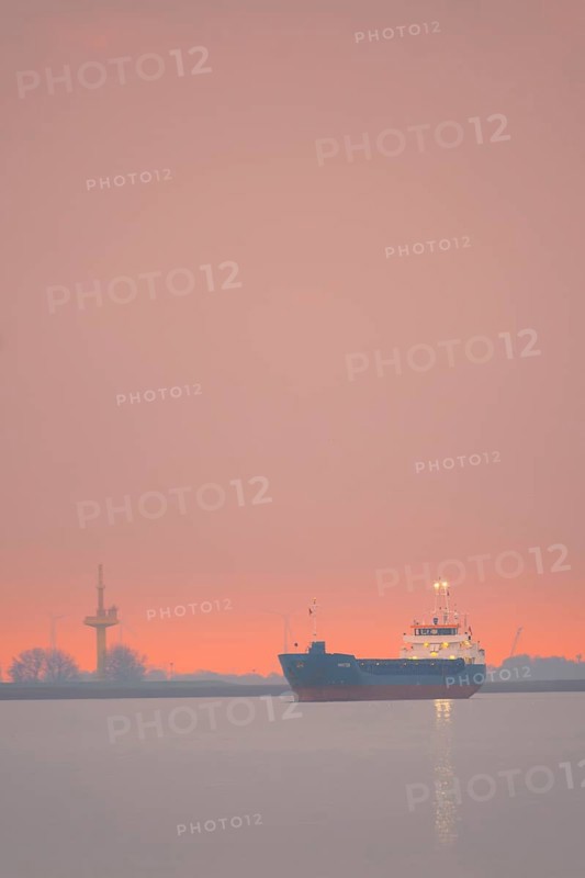 View of a ship on the Weser at sunset, Bremerhaven, Bremen, Germany