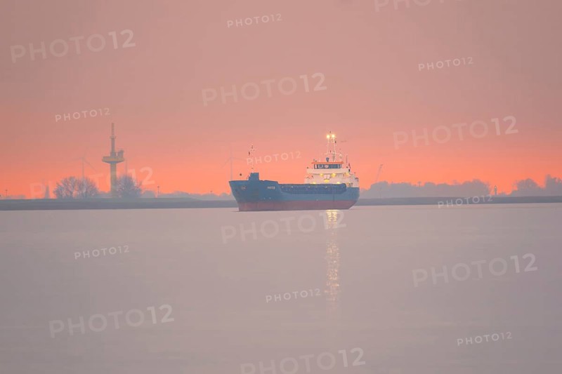 View of a ship on the Weser at sunset, Bremerhaven, Bremen, Germany
