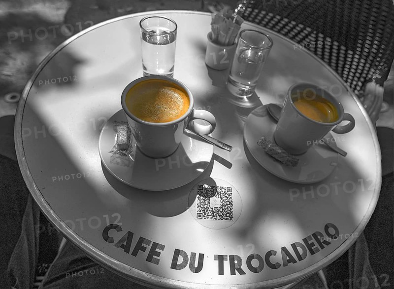 Two espressos on a bistro table in a cafe, black and white, Paris, France