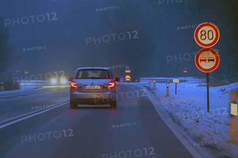 Cars during night snow flurries on B2, Nuremberg, Middle Franconia, Bavaria, Germany