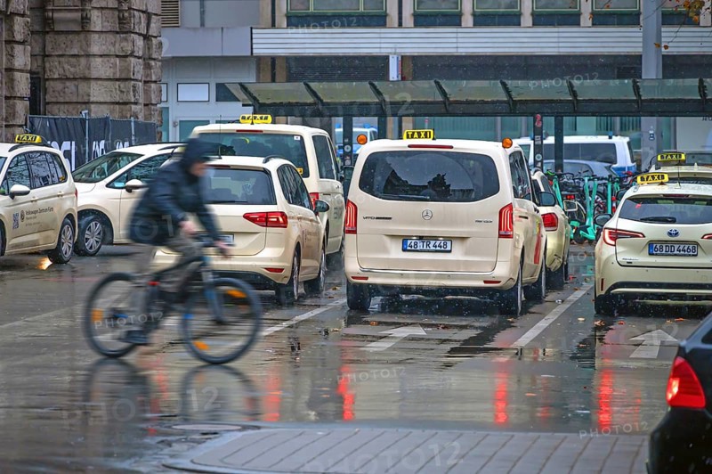 Waiting taxis at the train station in Regen, Nuremberg, Middle Franconia, Bavaria, Germany
