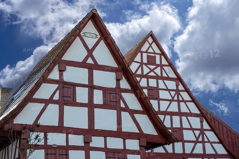 Timbered gables of historic farmhouses, built in 1744, Neunkirchen near Lauf an der Pegnitz, Middle Franconia, Bavaria, Germany