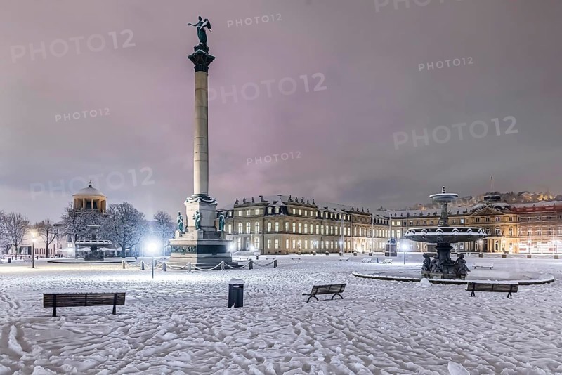 Winter in Stuttgart. It snowed overnight and the city is wintry white early in the morning. Schlossplatz with New Castle. Stuttgart, Baden-Württemberg, Germany