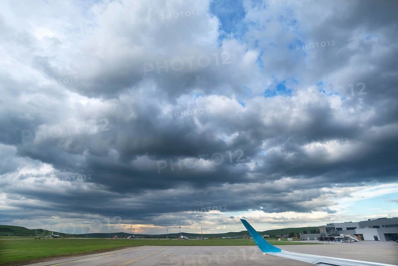 Rain clouds (Nimbostratus) over the airport of Cluj-Napoca, Transylvania, Romania
