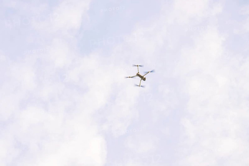 Drone in the sky with scattered clouds as it flies, fiberglass groundbreaking, Freudenstadt, Germany