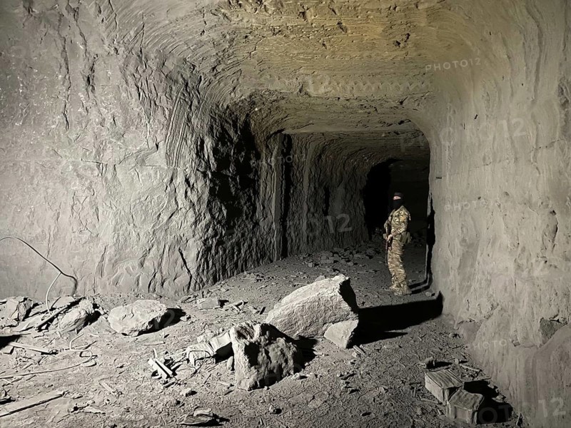 In Sarrin, Aleppo province, on January 27, 2026, footage captures an extensive subterranean network discovered following the withdrawal of Kurdish SDF fighters. The Syrian Army's clearing operations in the district near Ayn al-Arab revealed reinforced tunnels designed for vehicle transport, alongside abandoned military equipment and large quantities of unexploded ordnance, Aleppo, Ayn al-Arab, Syria