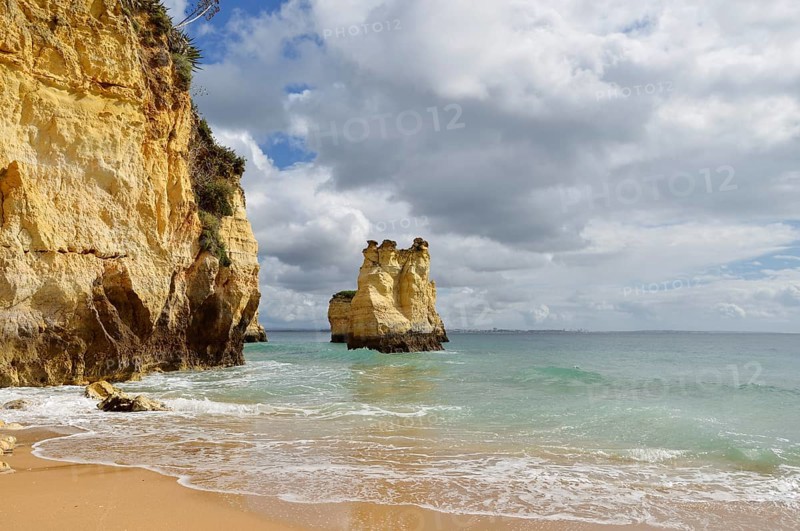 Rocky coast and beach, Praia do Pinhao, Lagos, Algarve, Portugal