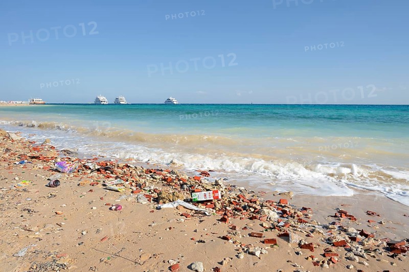 Beach with washed up trash, Hurghada, Red Sea Governorates, Egypt