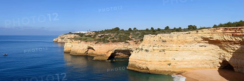 Rocky coast with caves, Praia da Corredoura, Algarve, Portugal