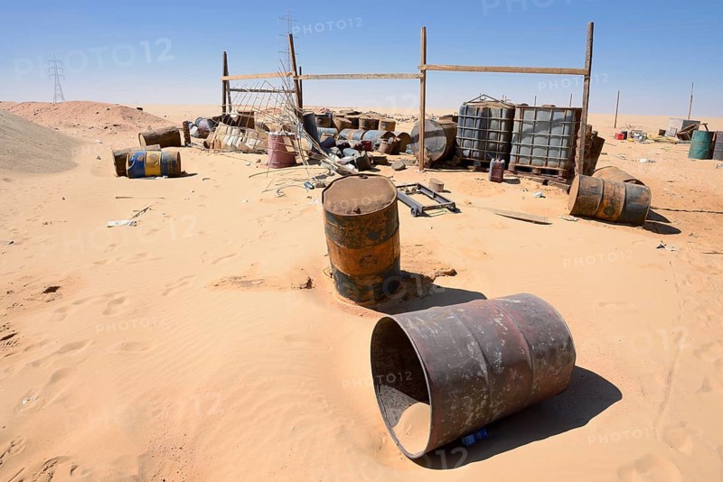 Empty kerosene barrels at a gas station in the Arabian Desert, Egypt