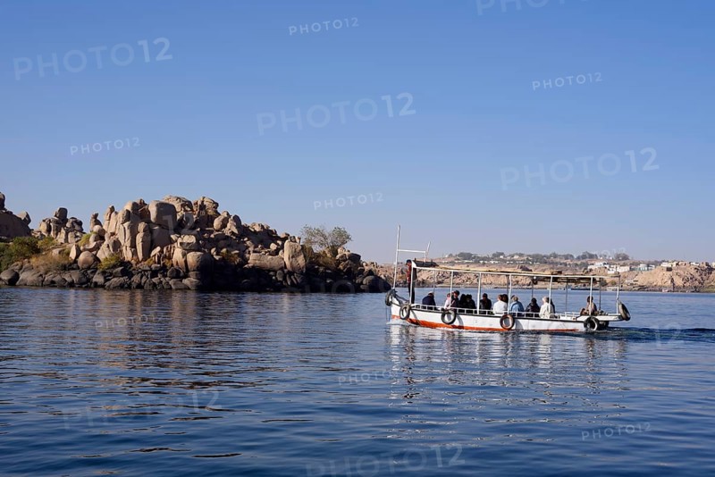 Sightseeing boat with tourists on Lake Nasser, Aswan, Egypt