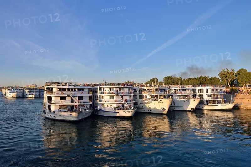 Nile cruise ships at the pier at the double temple of Kom Ombo, Kom Ombo, Egypt