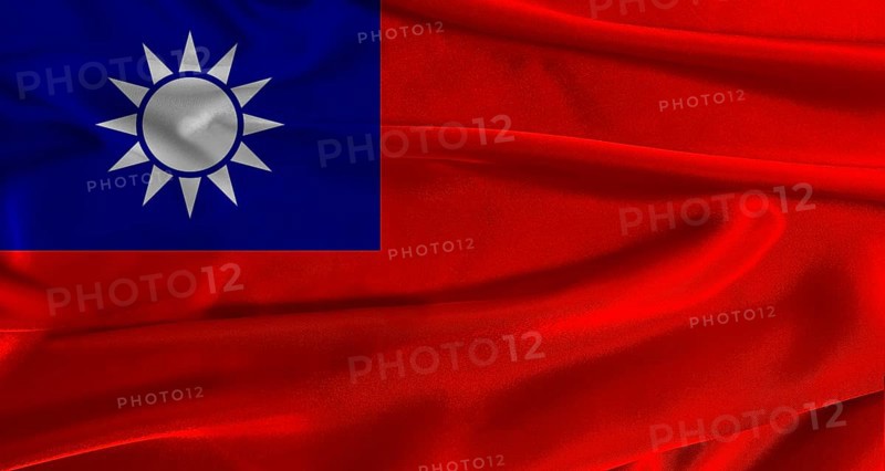 Flag of Taiwan with fabric textured background. Close up of National flag of Taiwan with realistic texture
