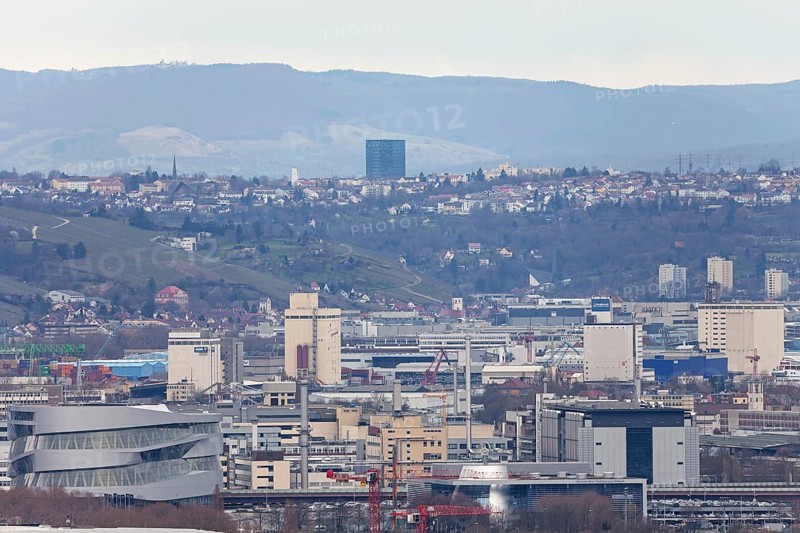 30.03.2018: Zoomed view of city roofs, towers and industrial buildings. Stuttgart, Baden-Wuerttemberg, Germany