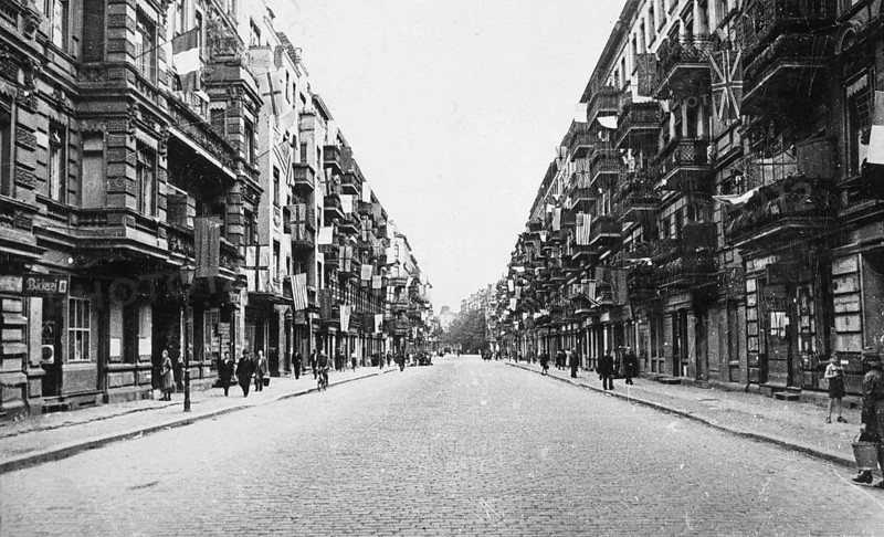 Street in Berlin, Allied flags and white flags hanging on the buildings, end of June 1945