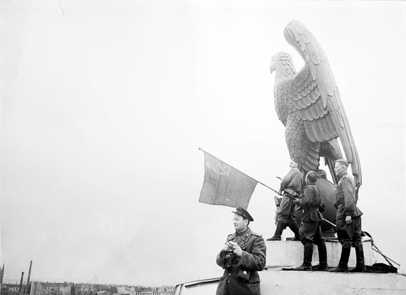 J. Chaldej arrived in Berlin with three Soviet flags. The first flag was raised at Tempelhof Airport. May 2, 1945, Berlin, Germany