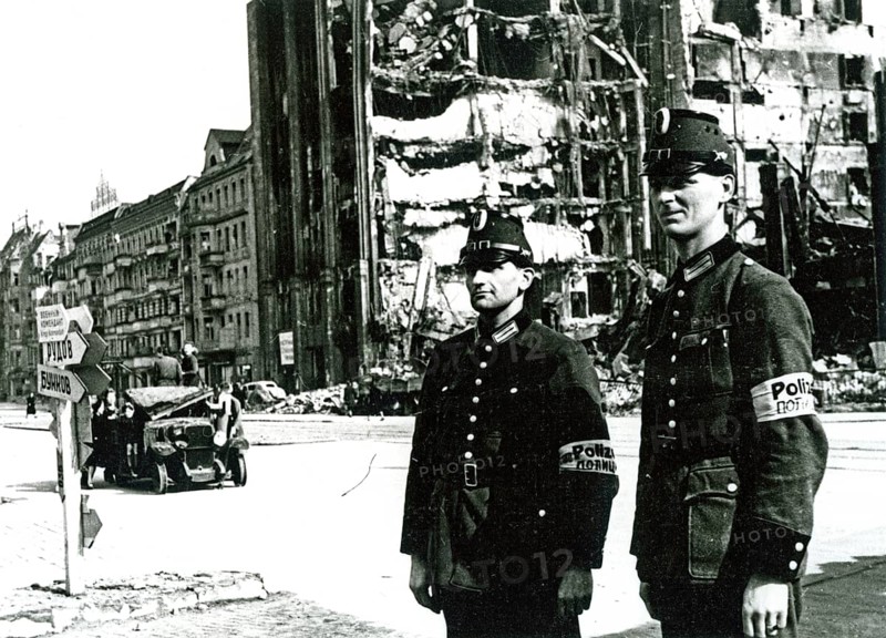 Two policemen, destroyed house, Berlin, Germany, June 1945