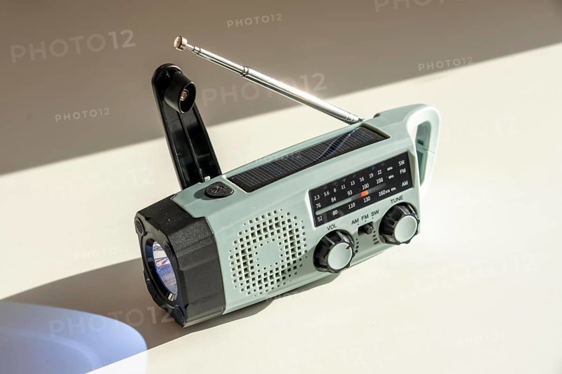 Radio with crank mode, by turning the crank we generate electricity in a dynamo, which charges a battery in a flashlight, in addition a small solar module to generate electricity from sunlight, for emergency preparedness in the event of a power failure, blackout, energy supply