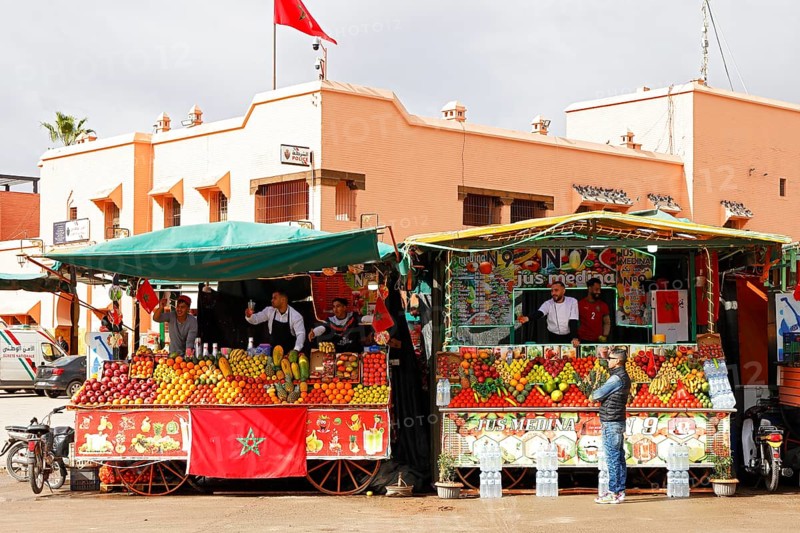 Stalls selling freshly squeezed fruit juices and smoothies on the Djemaa el Fna juggler square, Marrakech, historic old town, Medina, UNESCO World Heritage Site, Morocco