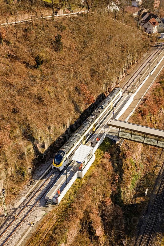 Aerial view of a train near a bridge in a hilly landscape, test run on the new Hermann-Hesse railway with Siemens Mireo Plus B trains, Calw, Germany