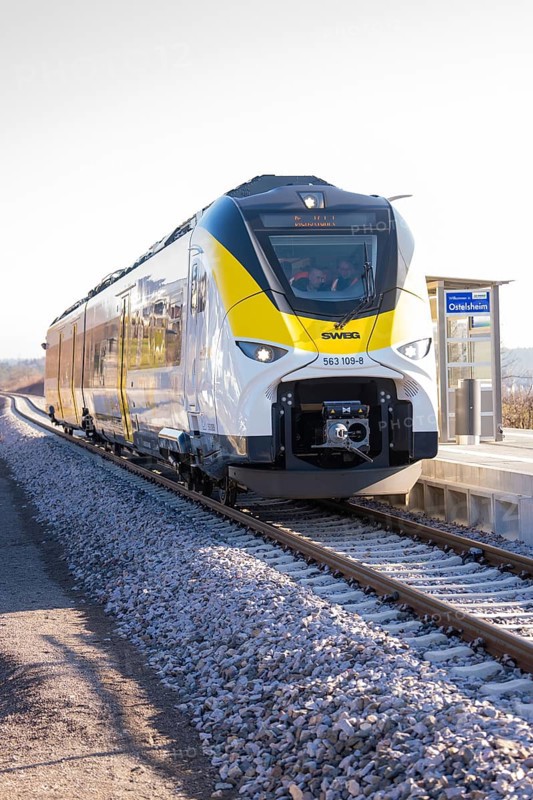 Train on platform in sunny weather, monorail shot, test run on the new Hermann-Hesse railway with Siemens Mireo Plus B trains, Calw, Germany