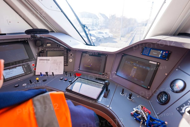 Train driver cabin with control panels and monitors for monitoring, test run on the new Hermann-Hesse railway with Siemens Mireo Plus B trains, Calw, Germany