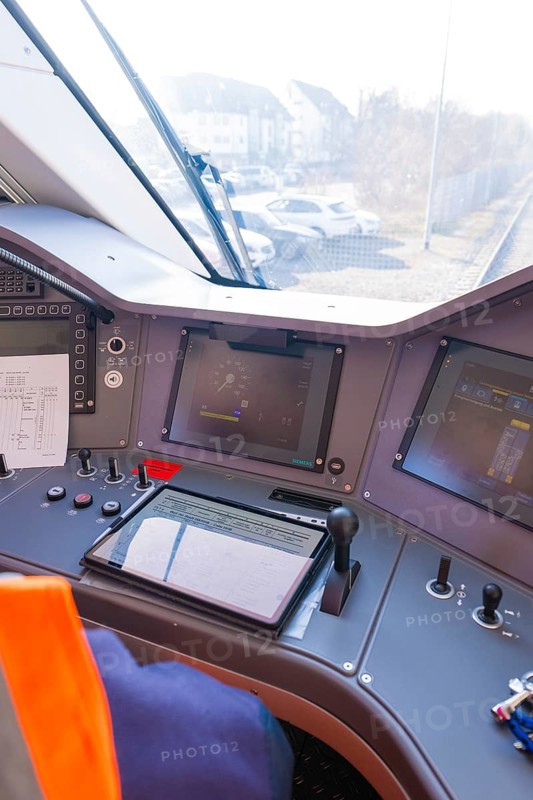 Train driver's cab with modern control monitors and control elements, test run on the new Hermann-Hesse railway with Siemens Mireo Plus B trains, Calw, Germany