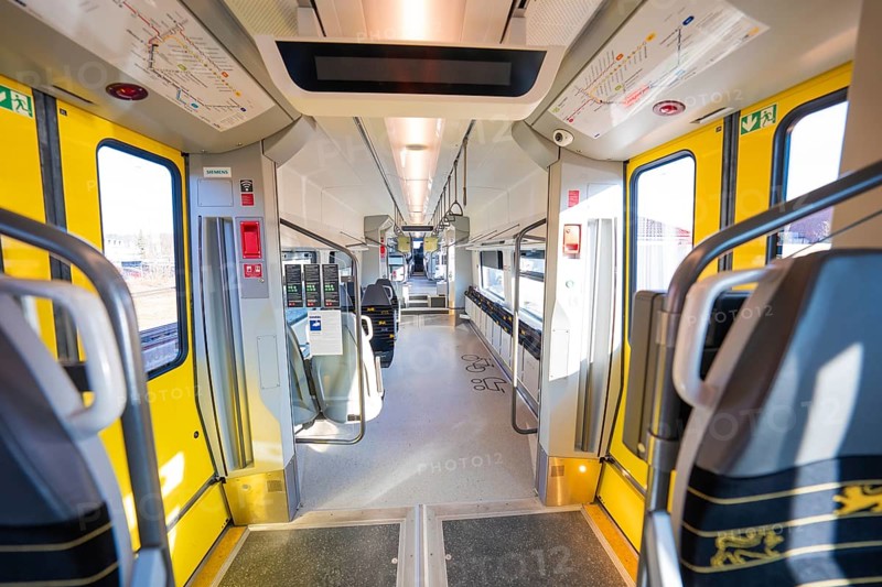 Modern interior of a train with yellow doors and panoramic windows, test run on the new Hermann-Hesse railway with Siemens Mireo Plus B trains, Calw, Germany