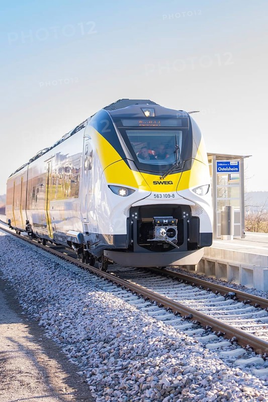 Modern yellow-black train on a sunny platform, test run on the new Hermann-Hesse railway with Siemens Mireo Plus B trains, Calw, Germany