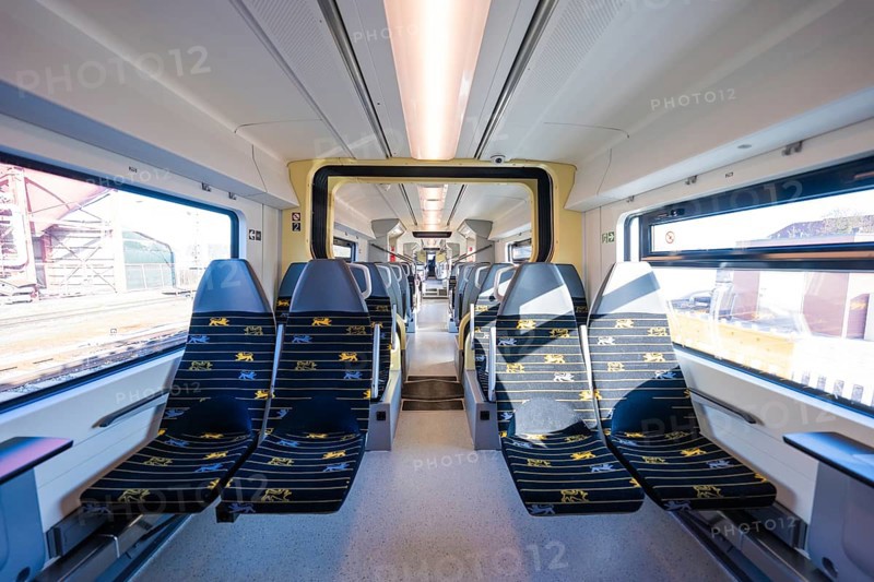 Modern train design with yellow accents and bright window light, test run on the new Hermann-Hesse railway with Siemens Mireo Plus B trains, Calw, Germany