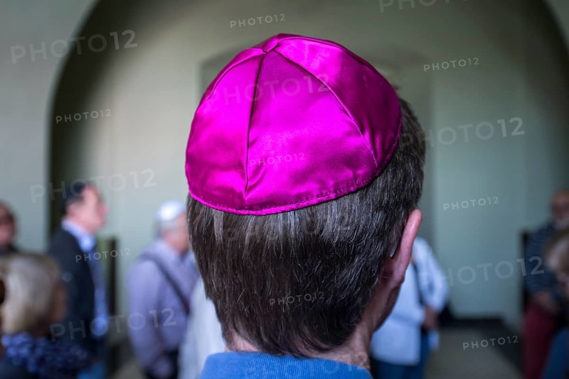 Visitor with a kippah in a synagogue, Ukraine