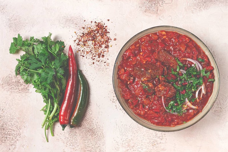 Chashushuli, a traditional Georgian dish, spicy, stewed meat with tomatoes and spices, homemade, no people