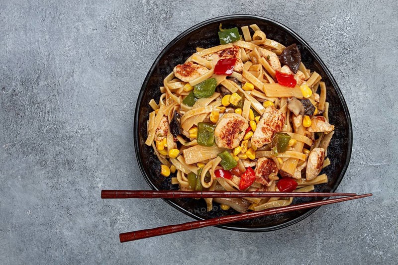 Fried noodles with chicken meat and vegetables, Bami Goreng, Indonesian dish, no people
