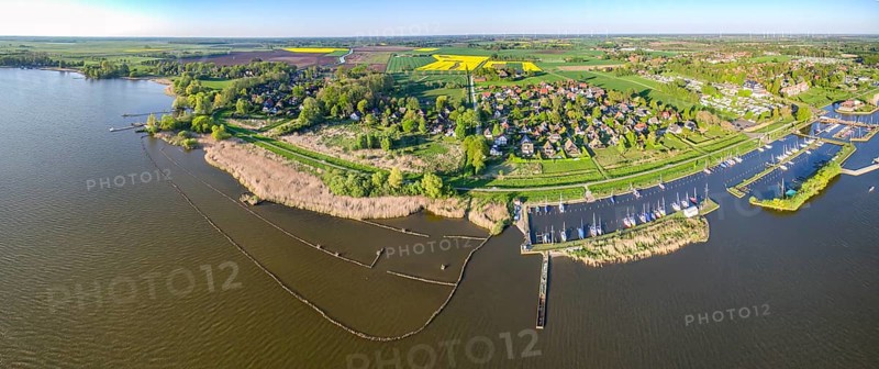 Panoramic aerial view of Dümmer See with marina sailing harbours and holiday homes, Lembruch, Lower Saxony, Germany