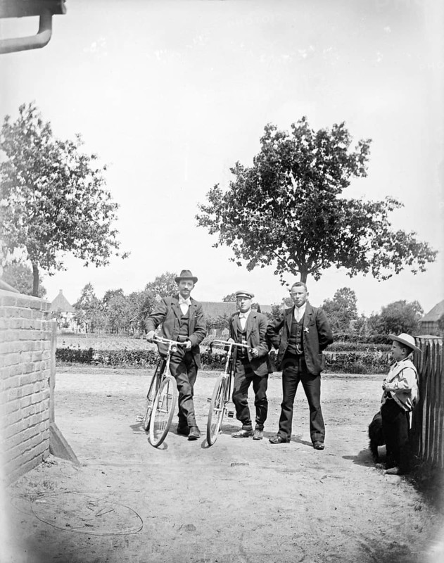 Men with bicycles, cyclists, hat, little boy, ca. 1920-1930, retro, vintage, old, historic, northern Germany