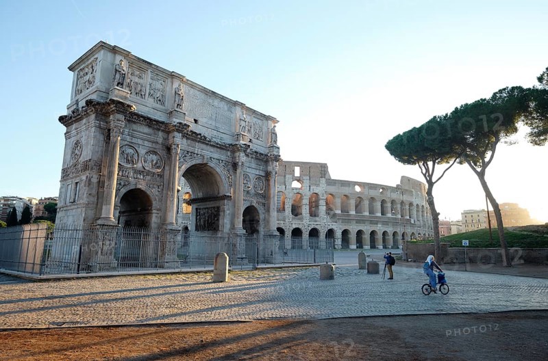Arch of Constantine and Colosseum at sunrise, Rome, Lazio, Italy