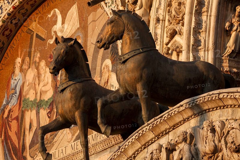 The Quadriga of St. Mark's Basilica, are a group of copies of the four life-size gilded bronze sculptures, Loggia dei Cavalli on the west portal of St. Mark's Basilica, Venice, Veneto, Italy