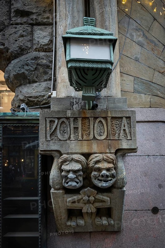 Trolls, stone figures from Kalevala, art nouveau architecture, Pohjola insurance building, Alexanterinkatu, main shopping street in the city center, Helsinki, Finland