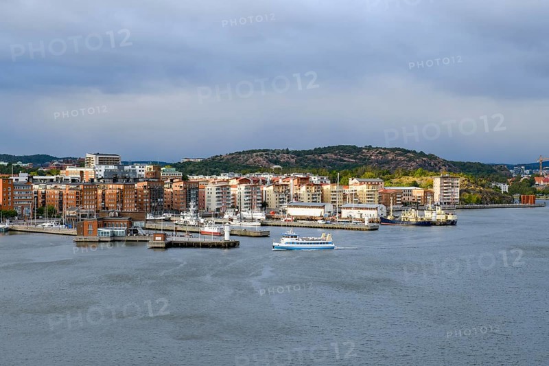 Panorama of a harbor with municipal buildings and cloudy sky in the background in Gothenburg, Stena Line Göteborg-Kiel, Göteborg, Västra Götalands län, Sweden