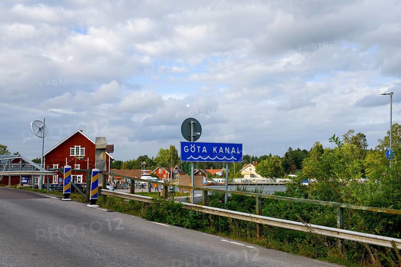 Road sign for Göta Canal in scenic area with cloudy sky, Sjötorp, Västra Götalands län, Sweden