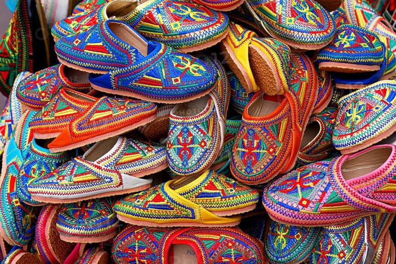 Sales stand with traditional colorful slippers at a market in Marrakech, historic old town, Medina, UNESCO World Heritage Site, Morocco