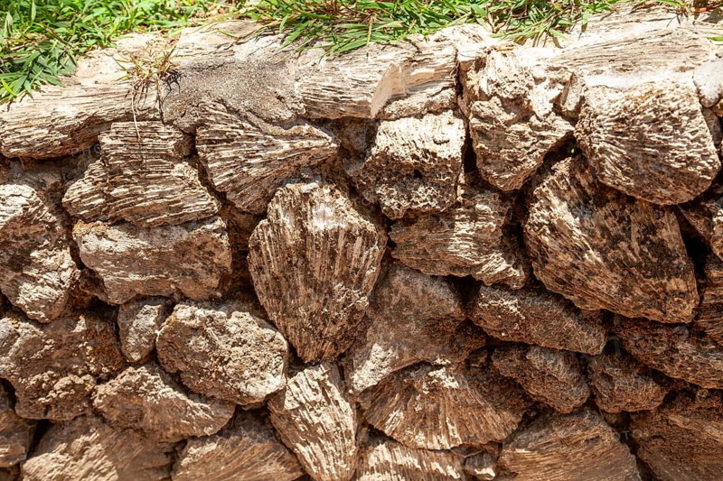 In the 80s, coral in the sea was dredged to be used as building material, Kuta, Bali, Indonesia