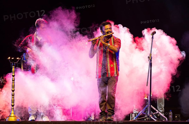 Flutist Dilip Hira performs during a cultural evening program at Shilpgram Mohotsav 2026 in Guwahati, India, on 21 January 2026