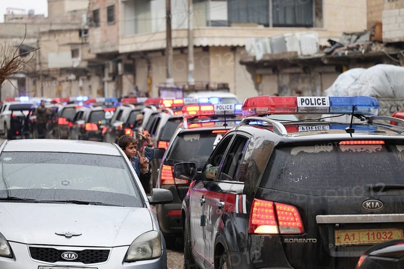 In Al Tabqah, Syria on January 18, 2026, a convoy of Syrian Government forces deploys throughout the city following the withdrawal of SDF forces. Local civilians are seen gathering in the streets to welcome the troops with celebrations, marking the return of government control to this strategic city in northeast Syria, Raqqa, Tabqah, Syria