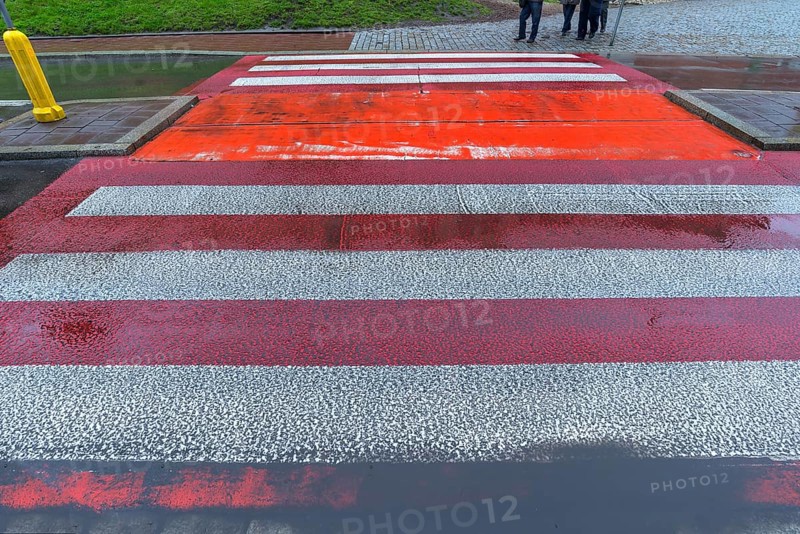 Zebra crossing marked in red and white, Krakow, Poland