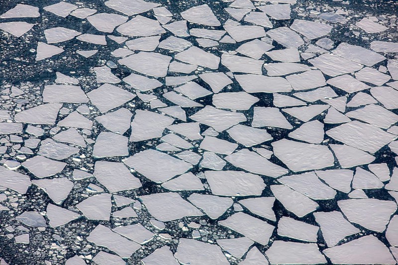 Aerial view of melting icepack in the East Greenland, Greenland (Kalaallit Nunaat), Arctic Ocean, climate change, global warming, geographically part of North America, politically part of the Kingdom of Denmark