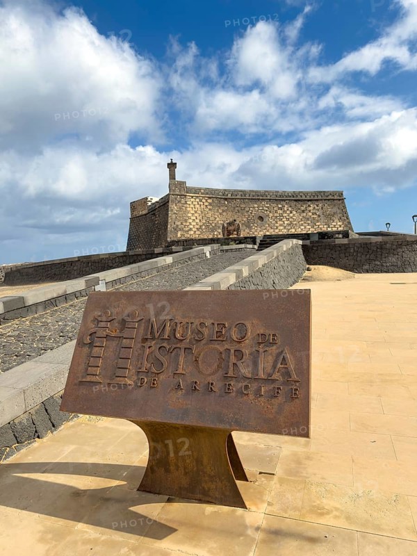 Castillo de San Gabriel fortress against blue sky with white clouds, Arrecife, Lanzarote, Canary Islands, Spain